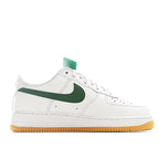 Nike Air Force 1 low-top sneakers, white leather with green swoosh and gum sole