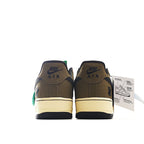 Brown low-top Nike Air Force 1 sneakers, cream sole, dark swoosh, lace-up