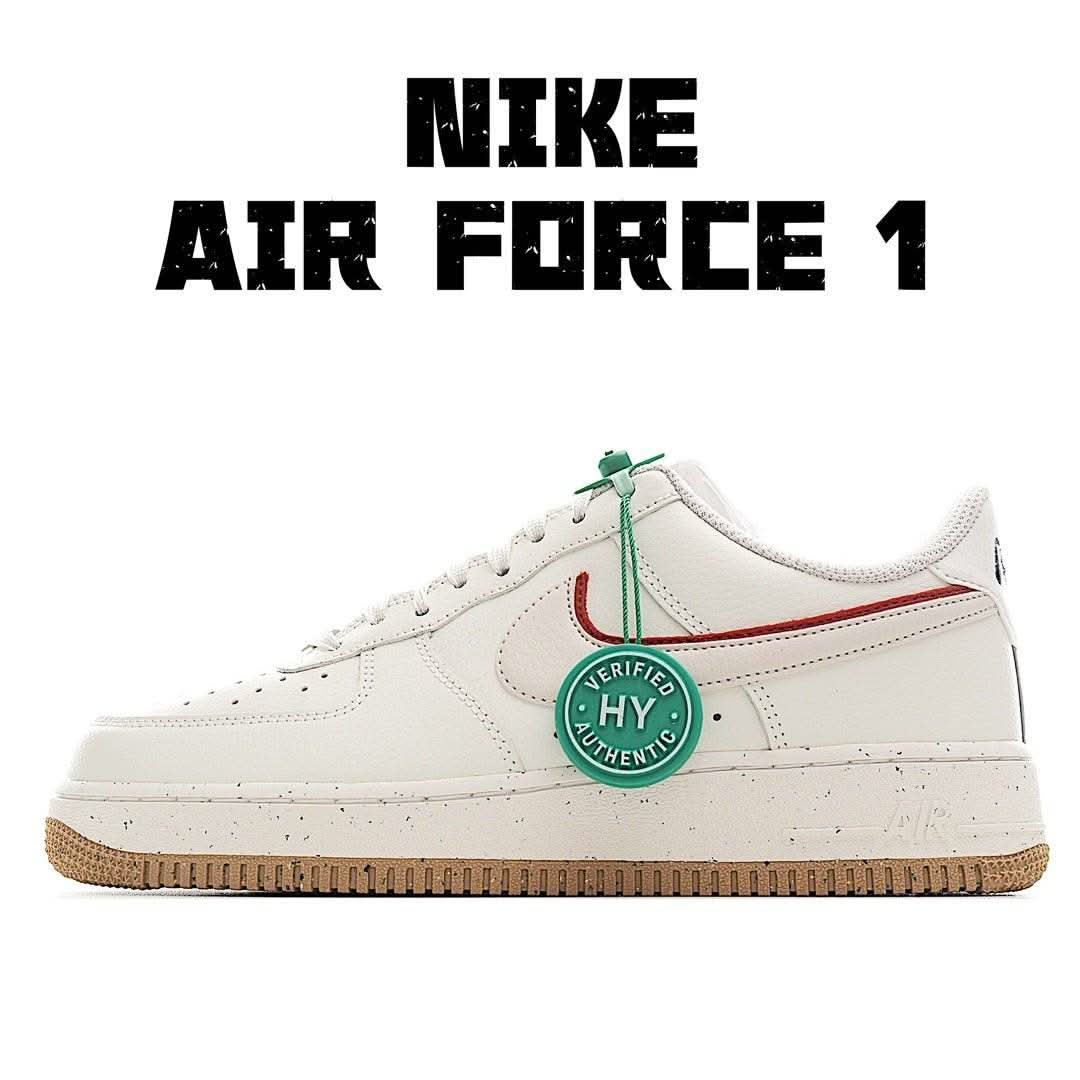 White low-top sneakers with red swoosh, gum outsole, and green HY badge on side
