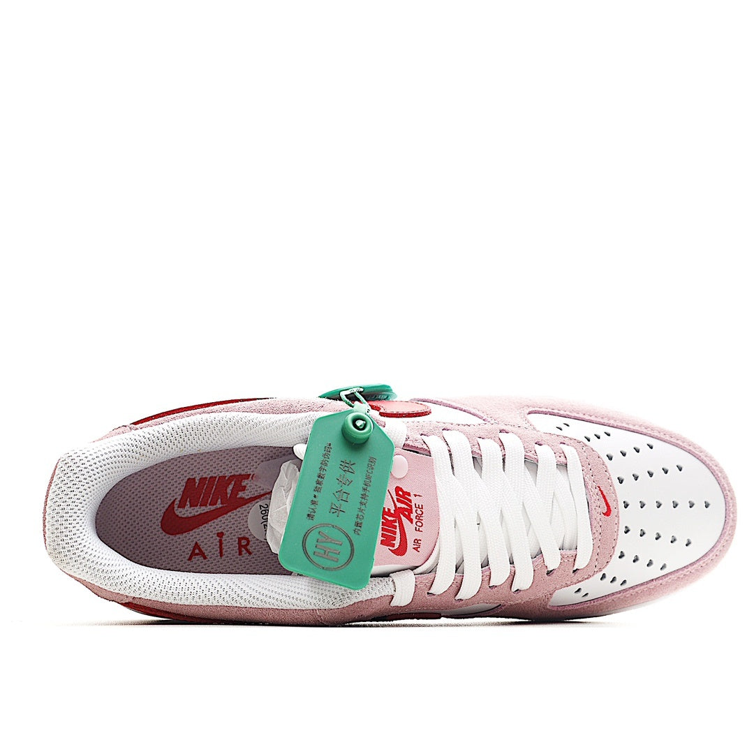 Pink Nike Air Force 1 low sneaker heel and laces, green HY tag visible