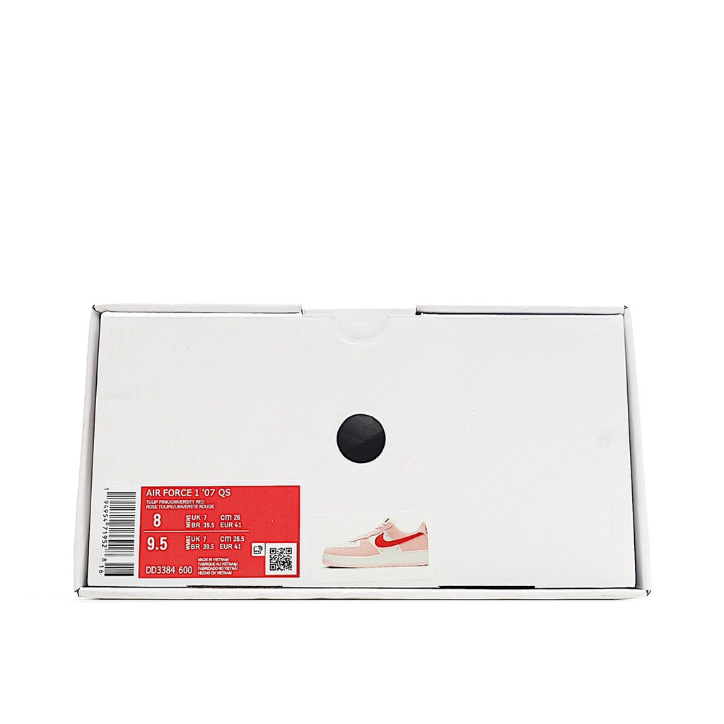 Sneaker box with pink and red Nike Air Force 1 shoes, size label visible