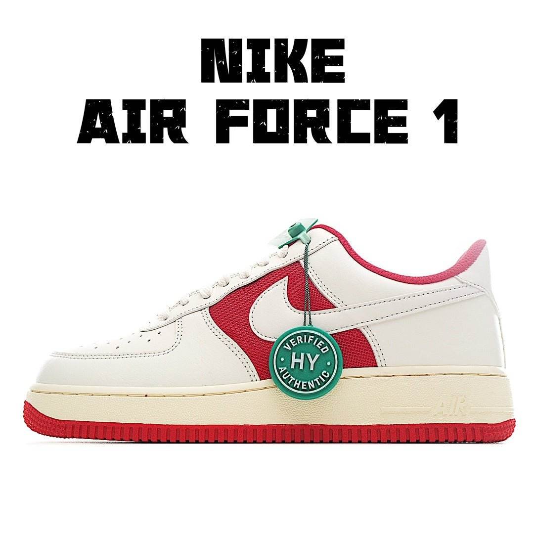 White Nike Air Force 1 sneaker with red panels, green heel mark, and cream sole
