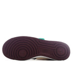 Nike Air Force 1 outsole with burgundy rubber tread and white midsole edge
