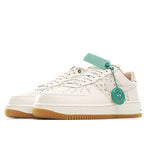 Nike Air Force 1 low-top sneaker, white leather with green hang tag and side logo