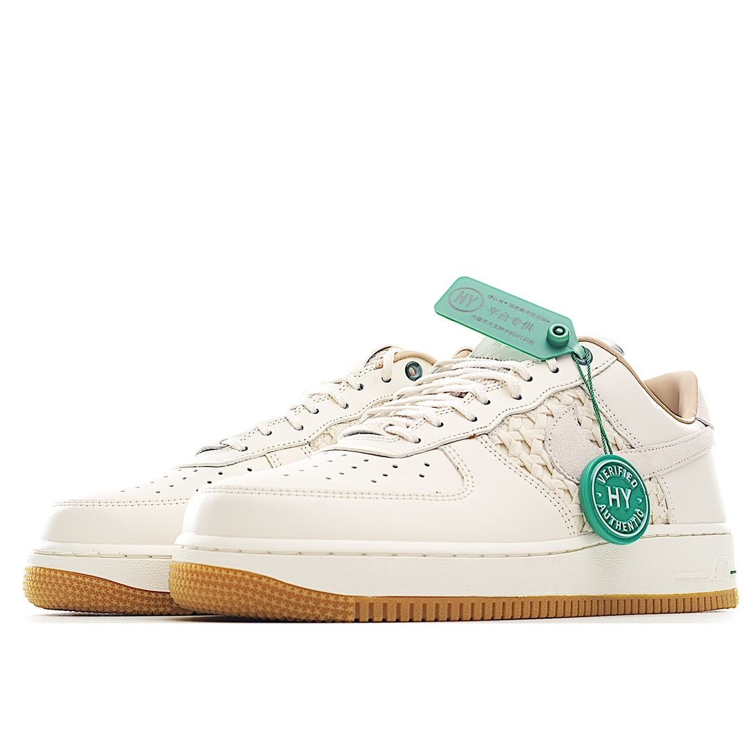 Nike Air Force 1 low-top sneaker, white leather with green hang tag and side logo