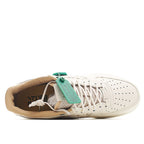Nike Air Force 1 low-top sneaker, white upper with green hang tag and laced detail