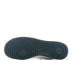 Teal rubber outsole for Nike Air Force 1 sneakers with circular tread pattern