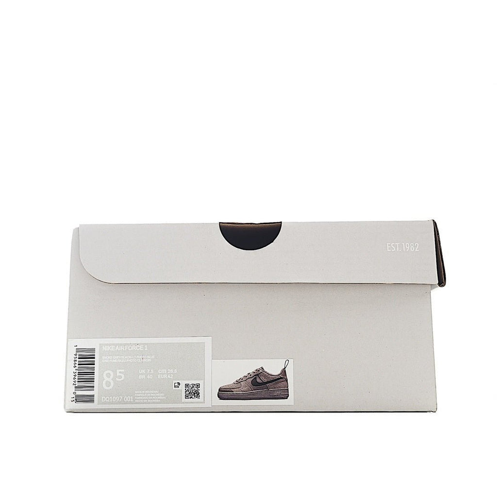 White shoe box with product label and printed image of a sneaker