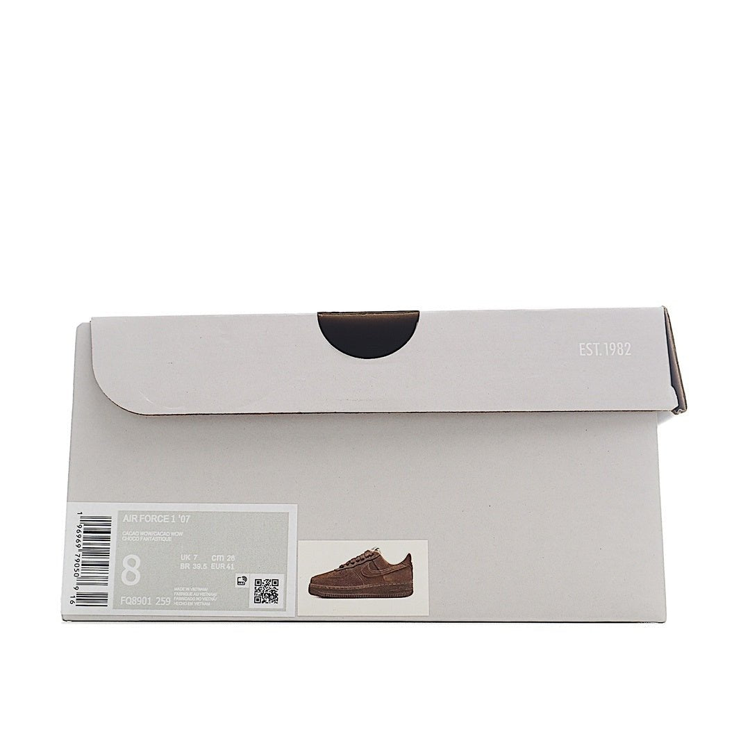 Shoe box with label showing brown low-top sneaker