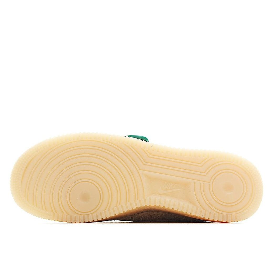 Nike Air Force 1 rubber outsole in light cream color with circular traction pattern