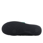 Black rubber outsole with tread pattern for gray sneakers