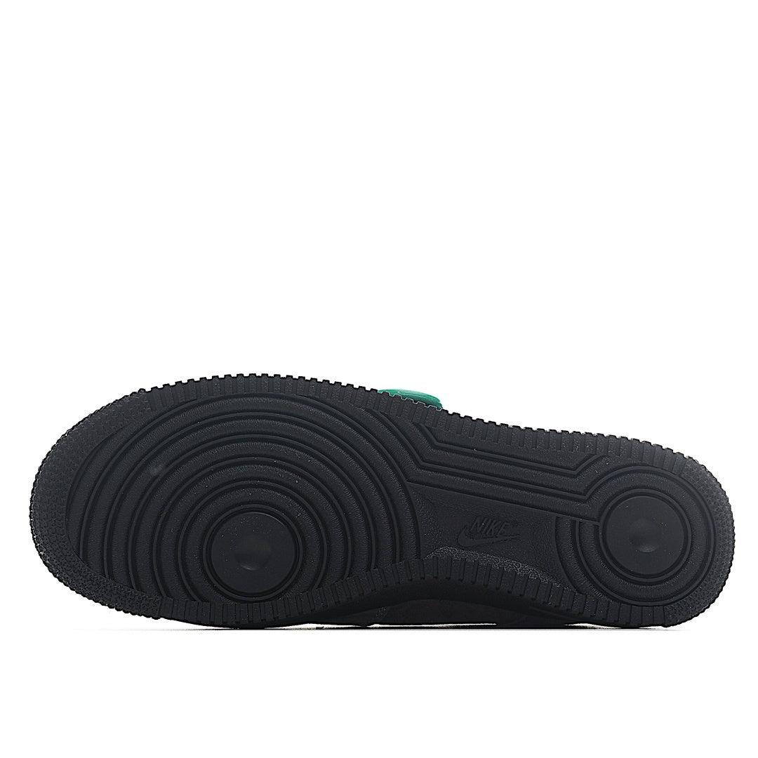 Black rubber outsole with tread pattern for gray sneakers