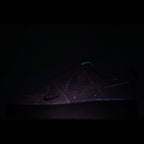Dark gray sneakers with subtle blue-purple stitching detail