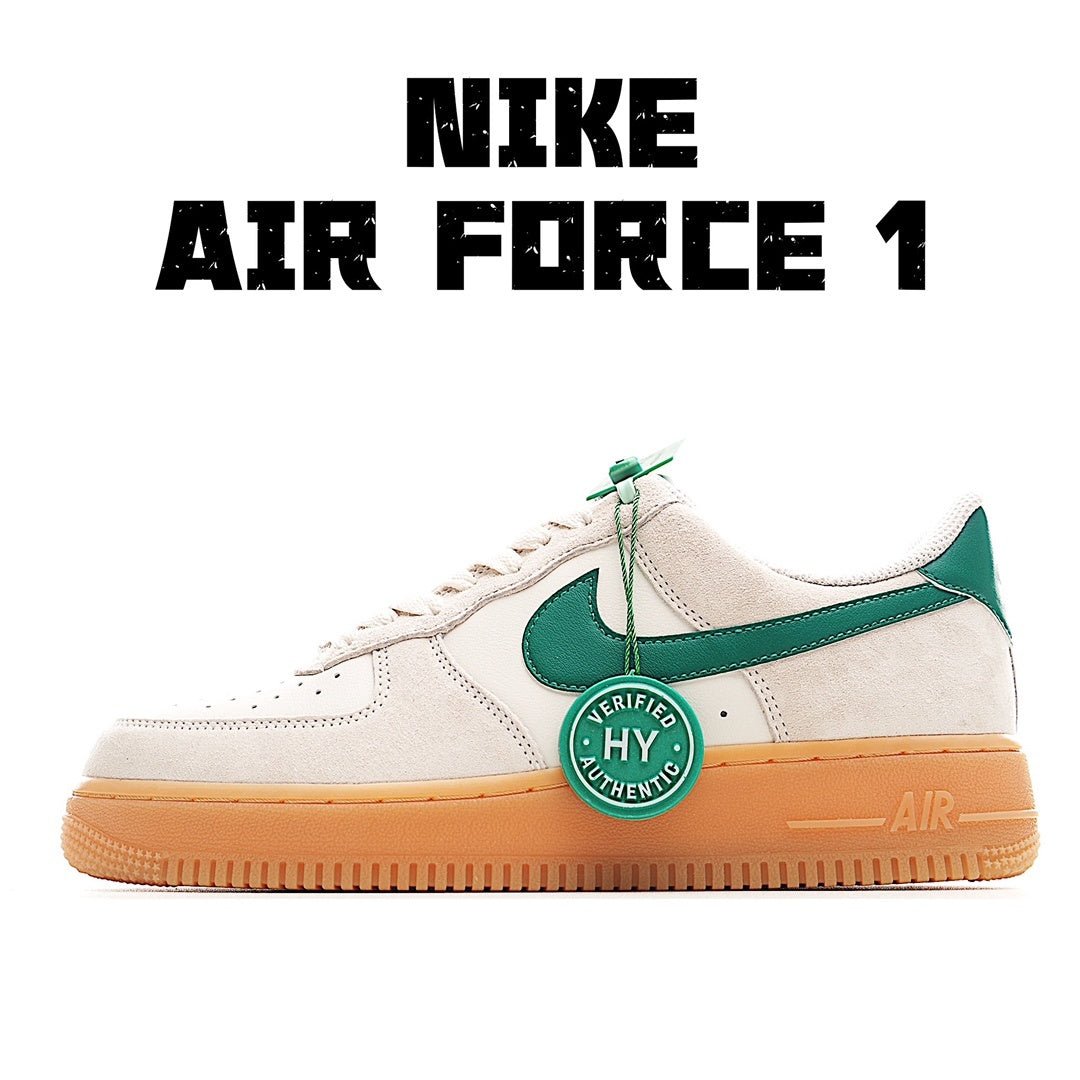 Nike Air Force 1 low-top sneakers in white with green accents and tan rubber sole
