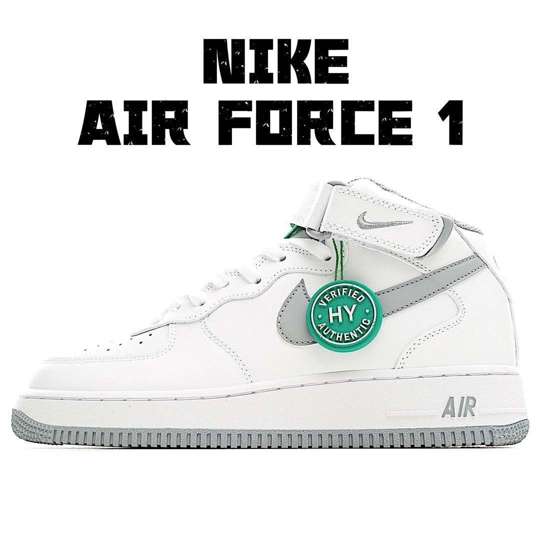 White Nike high-top sneaker with green HY badge, gray swoosh, and lace-up design
