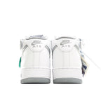 White high-top sneaker heel view with gray outsole and green accents on back