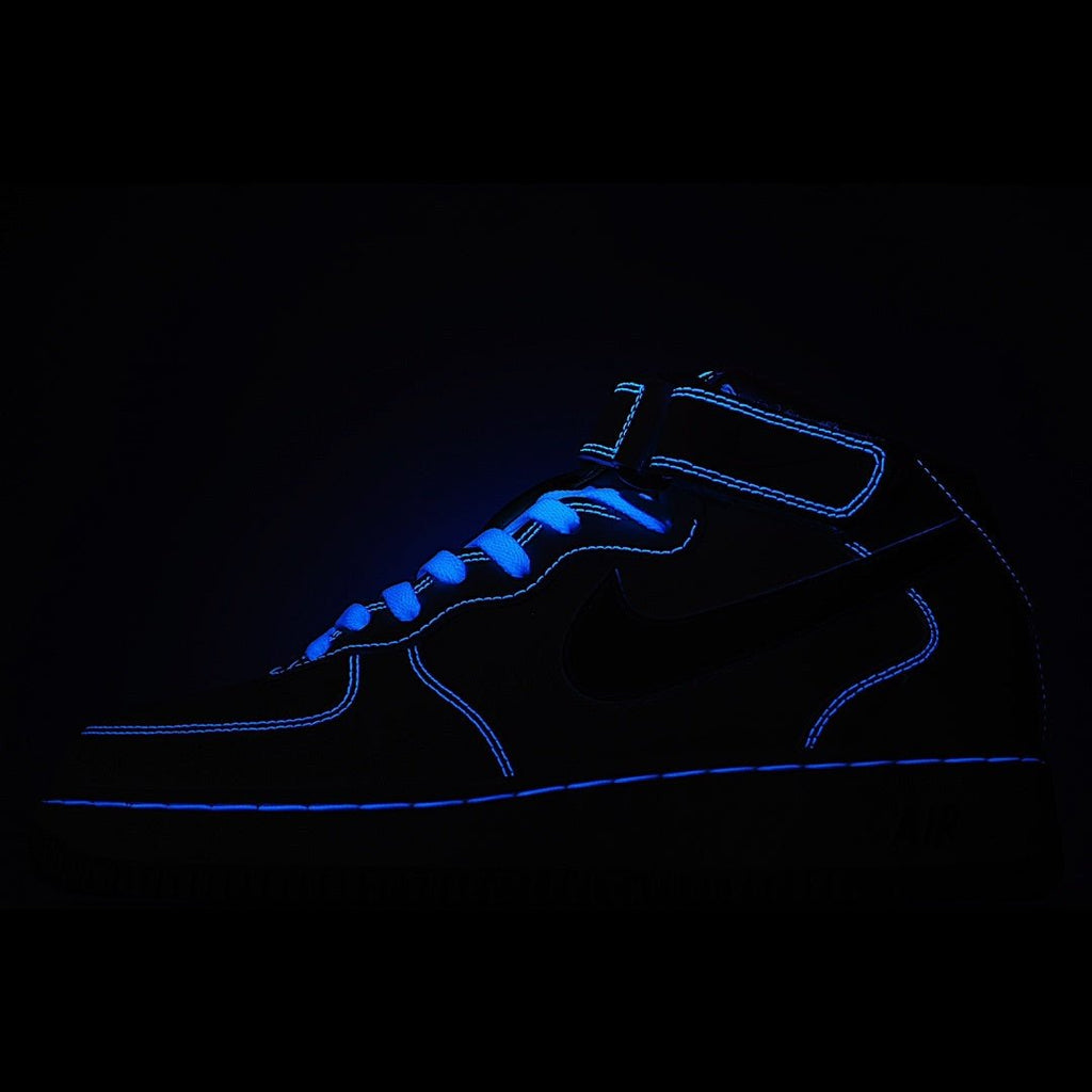 Dark blue sneaker with glowing blue outline and lace-up silhouette