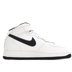 White low-top sneaker with black swoosh and stitched toe panel