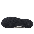 Black rubber outsole with textured tread pattern