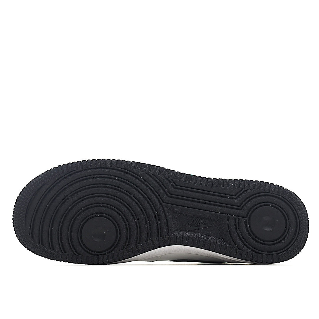 Black rubber outsole with textured tread pattern