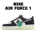 Black and white low-top sneaker with teal accents, lace-up, thick light-olive sole