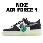 Black and white low-top sneaker with teal accents, lace-up, thick light-olive sole