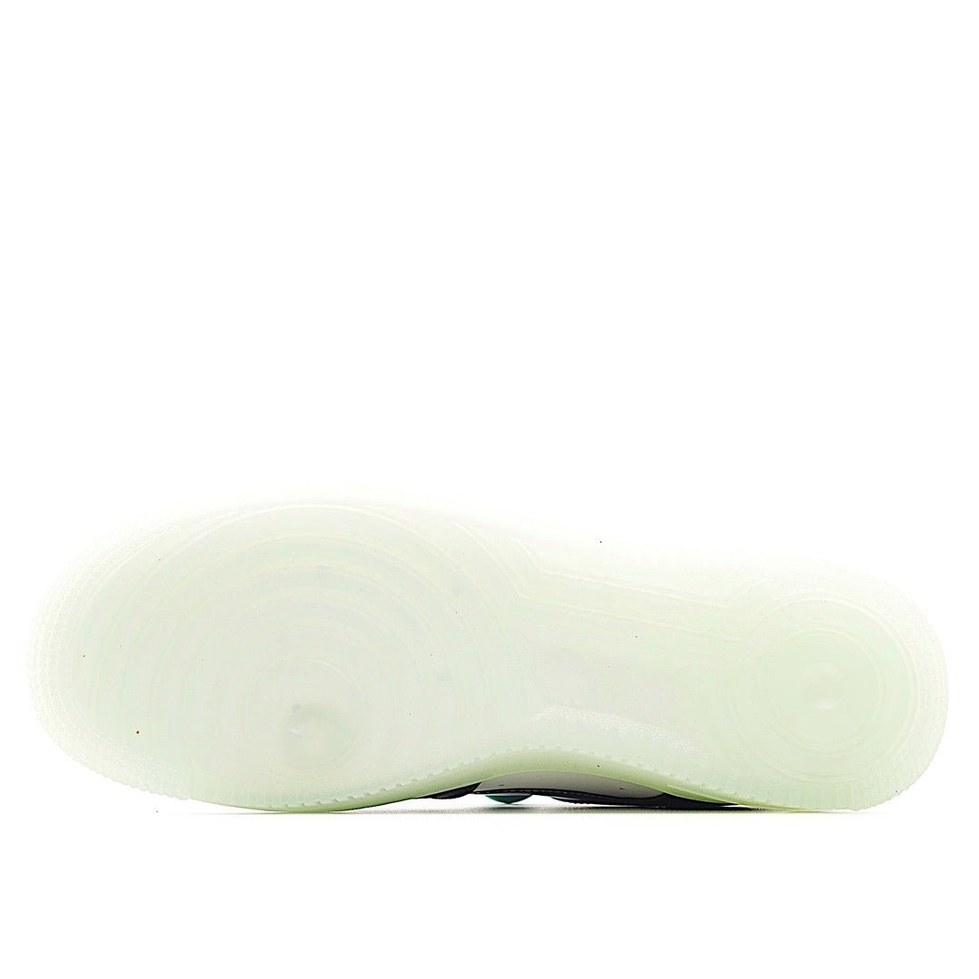Light-olive sneaker outsole with tread pattern, underside view