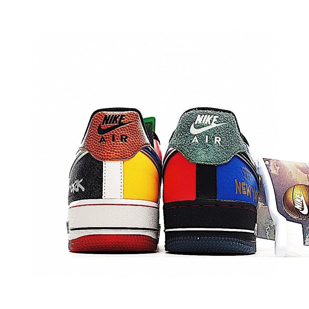 Nike Air Force 1 sneakers, heel view with orange and green NIKE AIR tabs and black sole