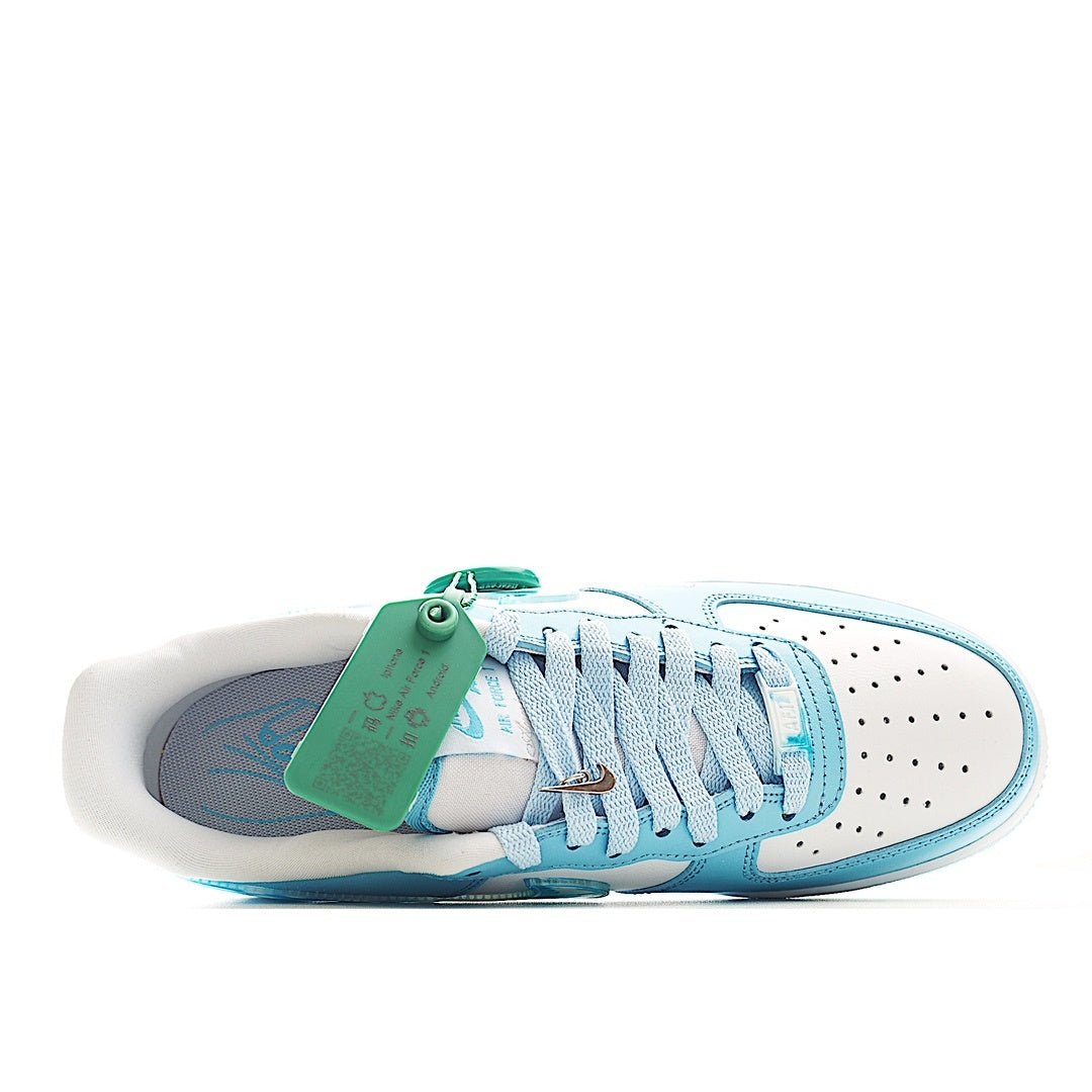 Light blue and white Air Force 1 sneakers with green hang tag