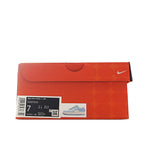 Nike Air Force 1 shoe box in coral orange with Nike logo