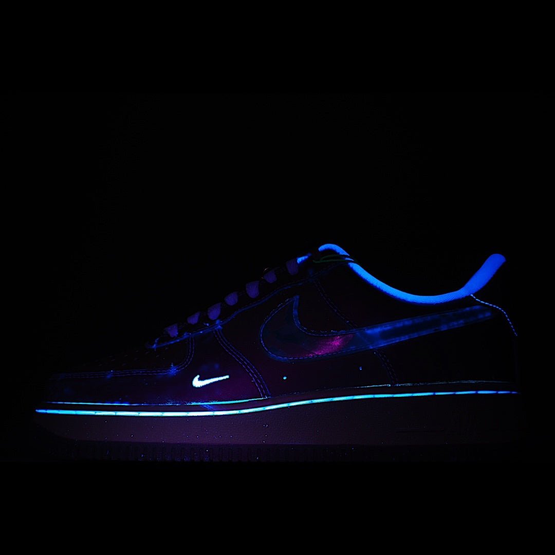 Dark blue Nike Air Force 1 sneakers with glowing blue accents