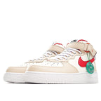 Cream leather high-top sneakers with red swoosh, white laces, and green HY patch