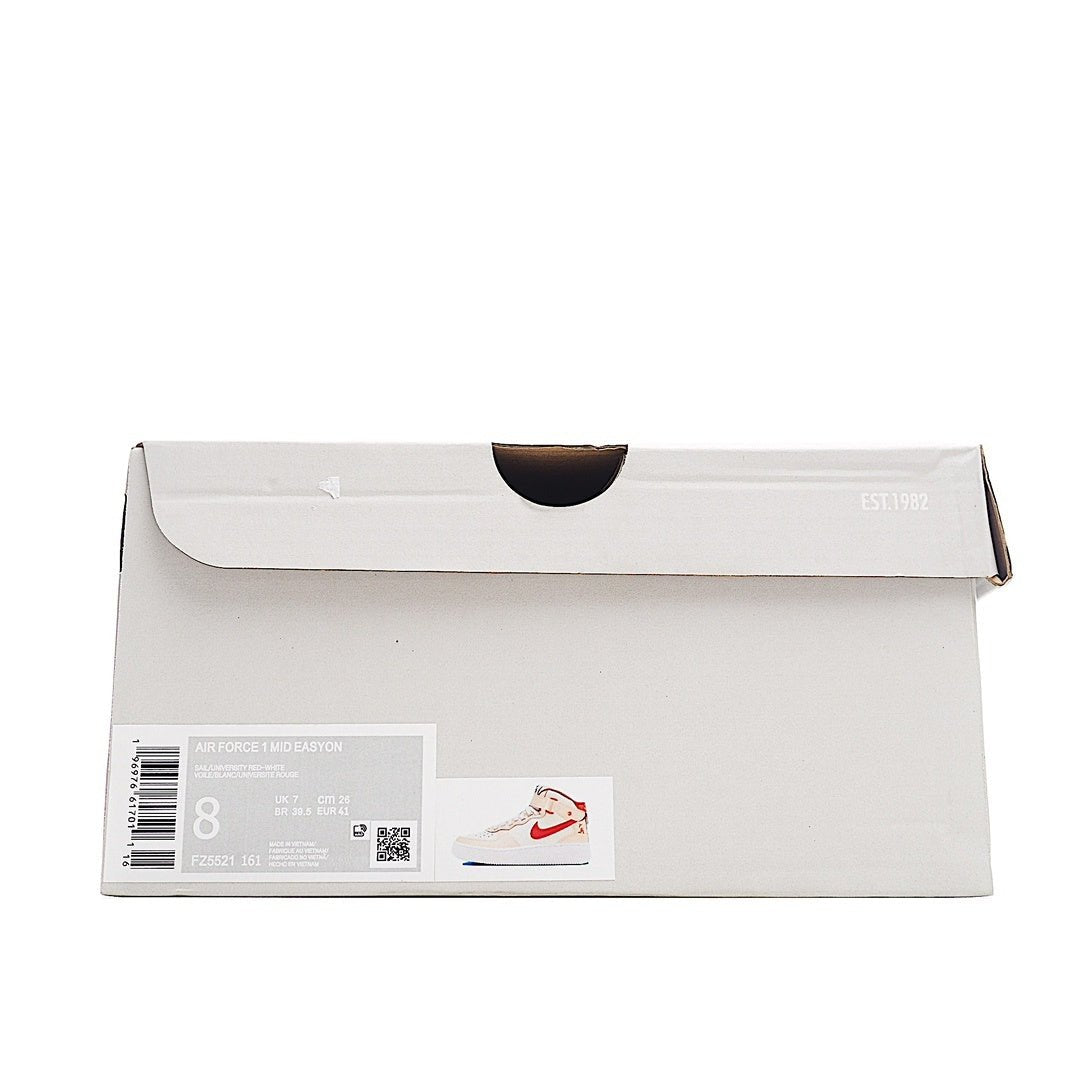White shoebox with product label and photo of cream-and-red sneakers