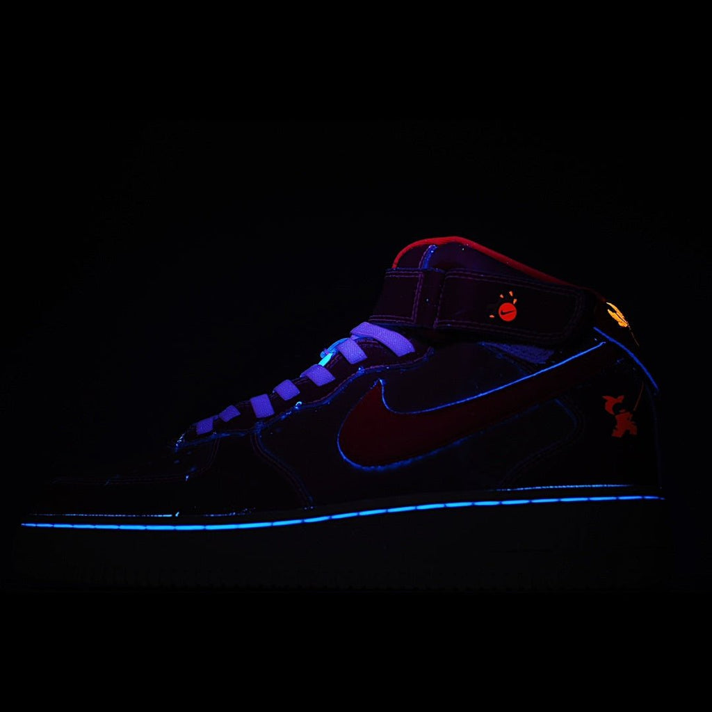 Dark high-top sneaker with blue glow accents and red logo on side