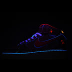 Dark high-top sneaker with blue glow accents and red logo on side