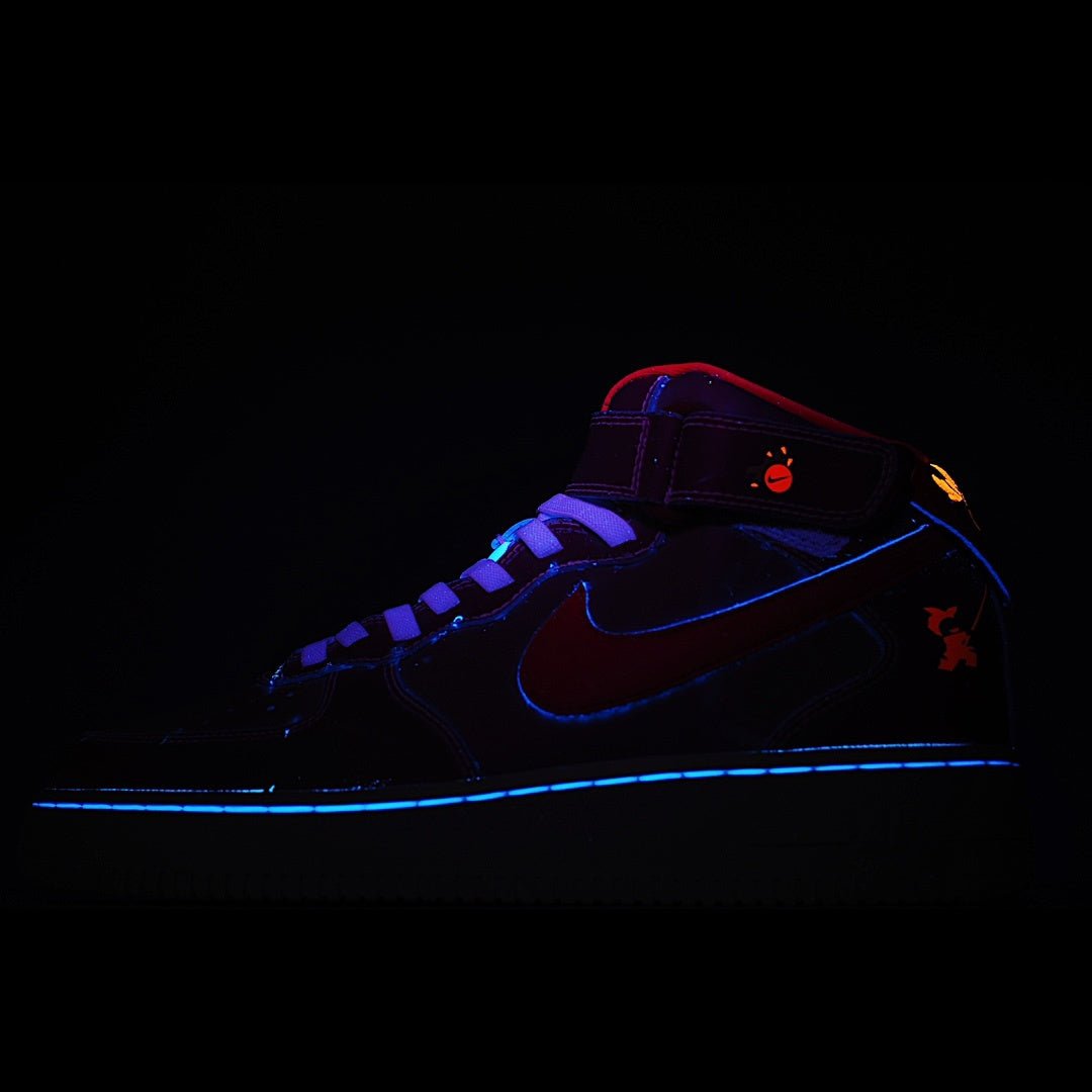 Dark high-top sneaker with blue glow accents and red logo on side
