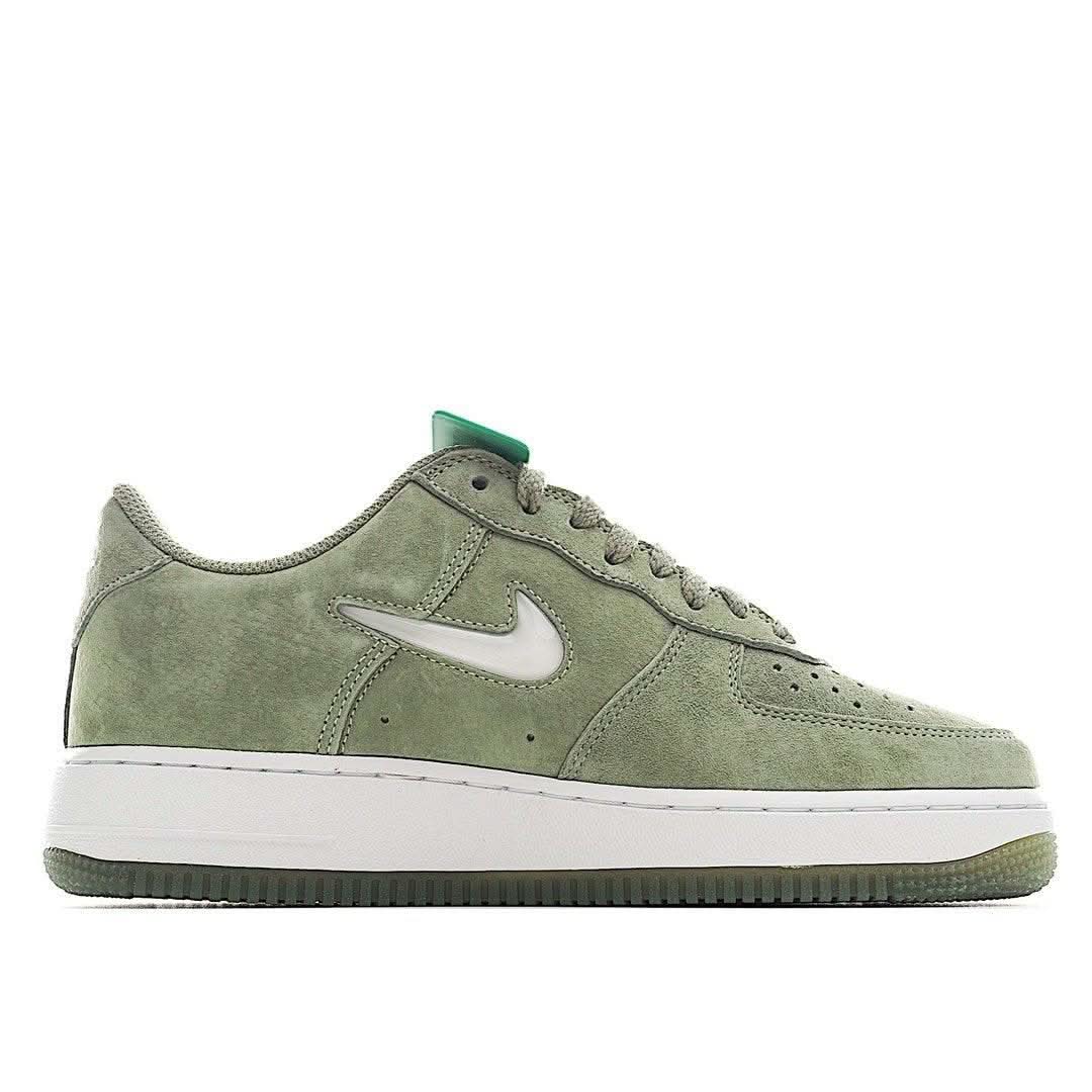 Olive suede low-top sneaker with white sole and teal lace-up