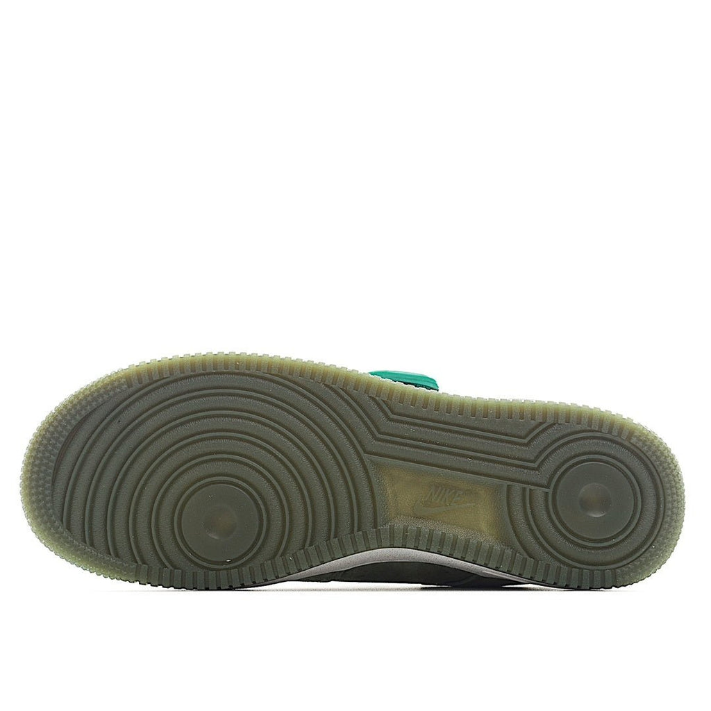Olive green Nike Air Force 1 outsole with textured tread and white midsole edge
