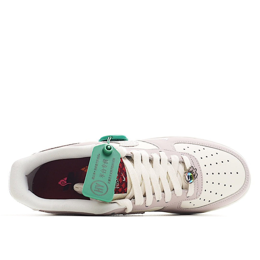 Low-top sneaker open collar showing white laces and dark interior with attached tag.