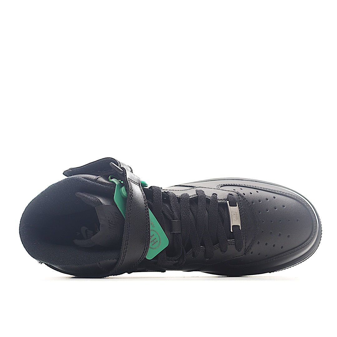 Dark gray/black high-top sneaker shown from side with green tongue detail and laces
