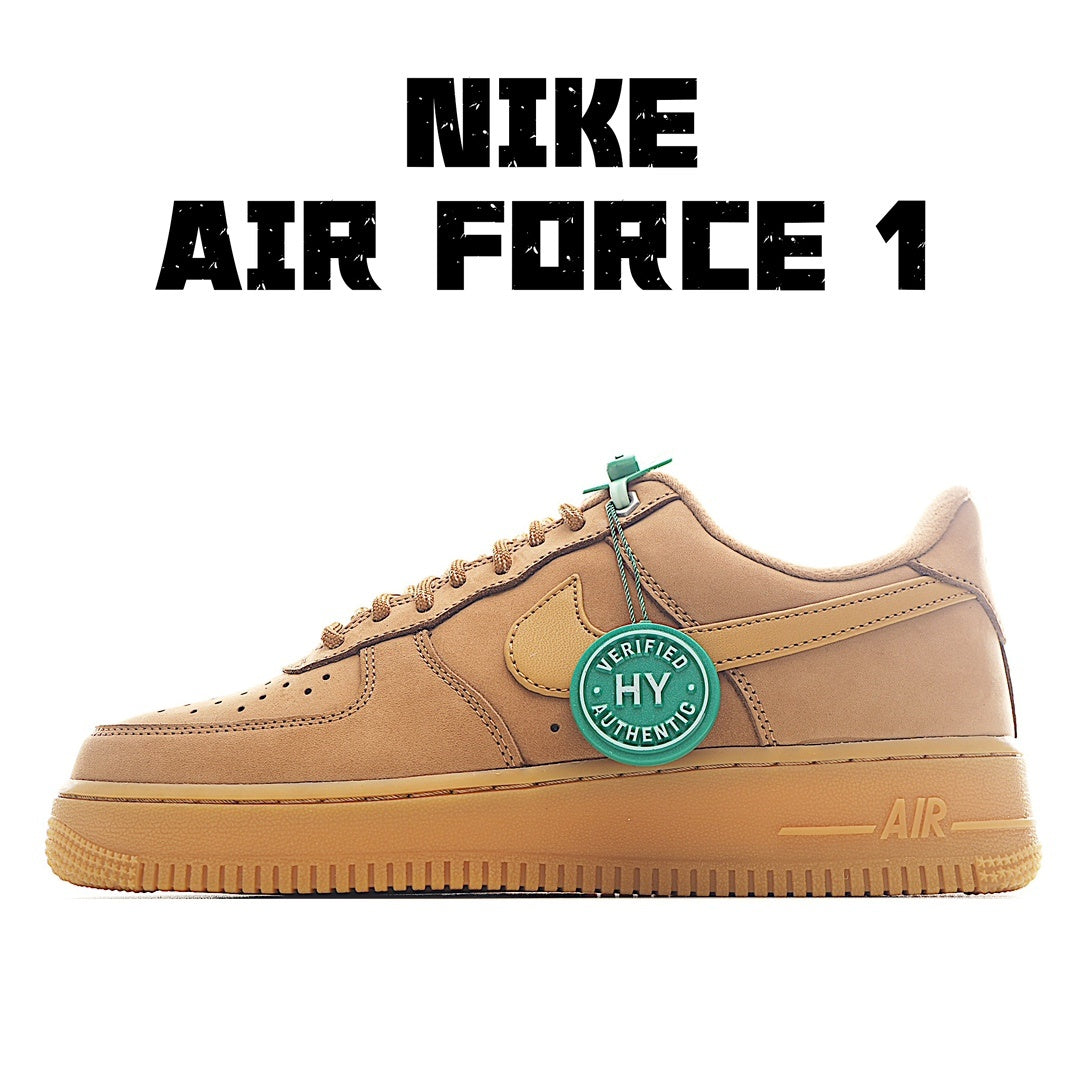 Low-top Nike sneaker in tan leather with teal lace tabs and logo