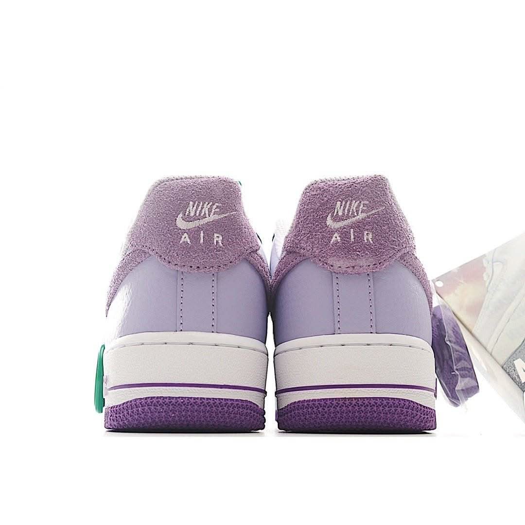 Lavender Nike Air Force 1 low-top sneakers, back view with Nike Air heel text