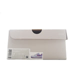 Shoe box with label and small sneaker photo on front flap