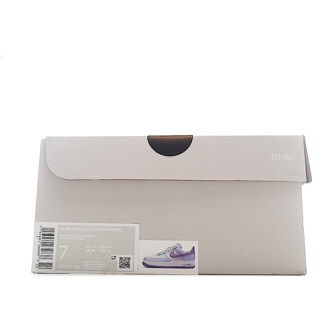 Shoe box with label and small sneaker photo on front flap