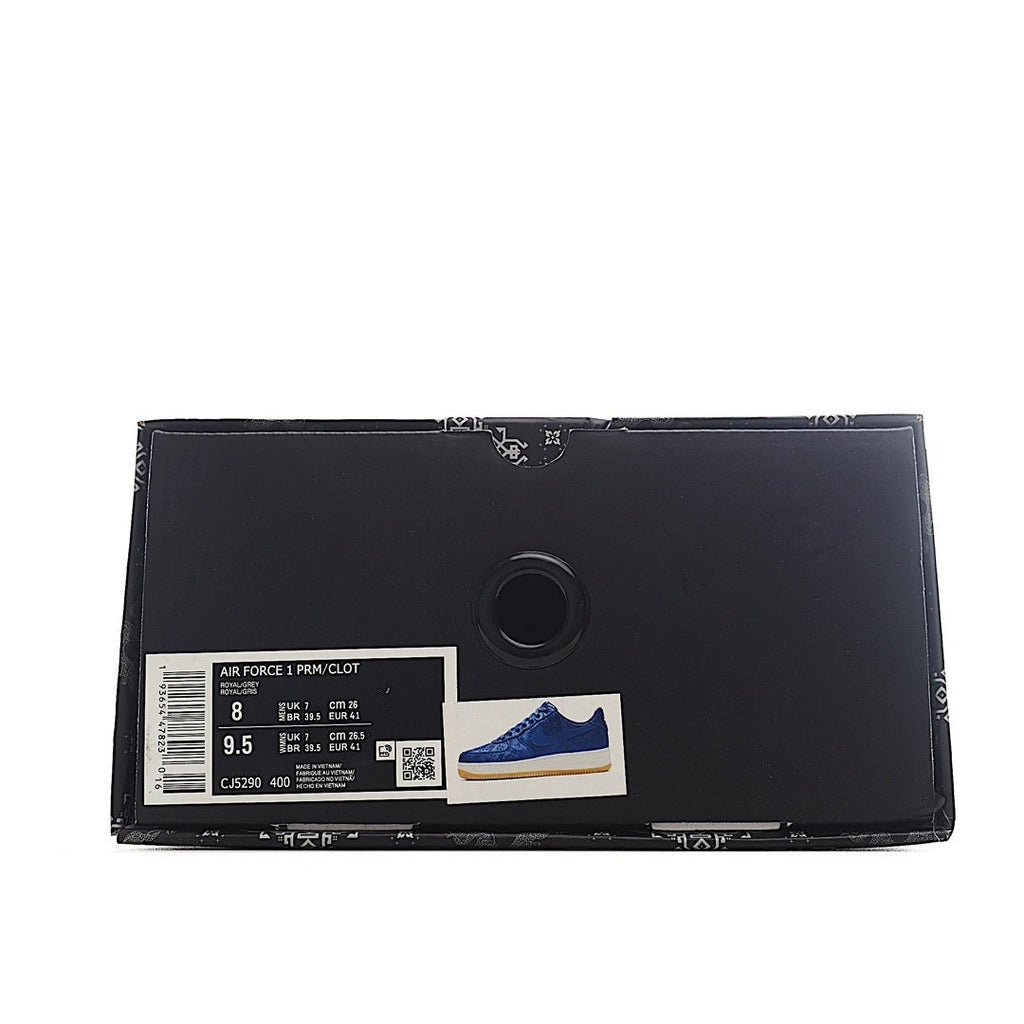 Black Nike Air Force 1 shoebox with barcode label and size info.