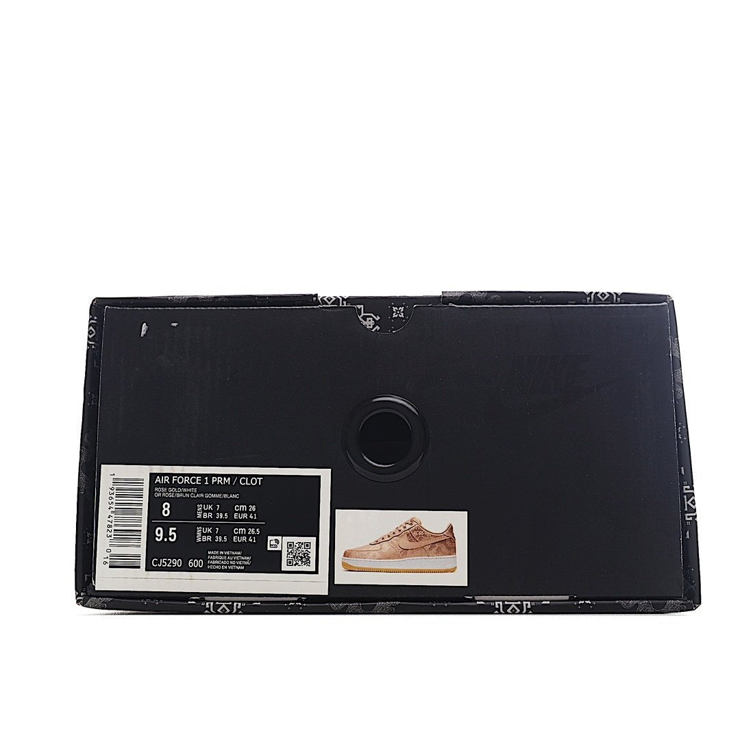 Black shoe box with product label and small sneaker image on the front