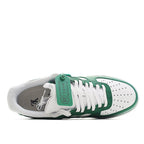 Green and white sneaker with white laces, padded tongue, and mesh-textile side