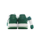 Pair of green leather sneakers with white midsoles and stitched heel tabs