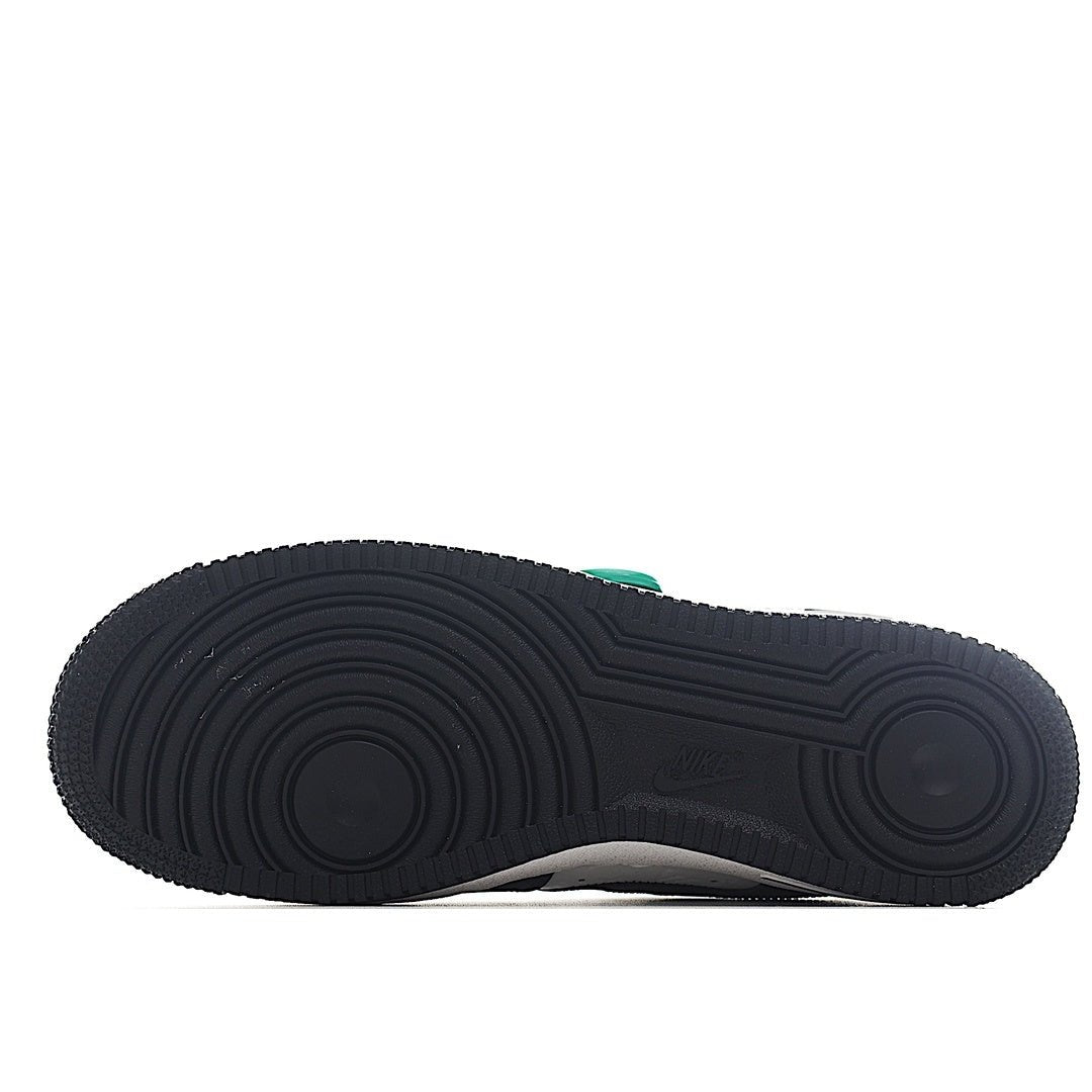 Black rubber outsole with circular traction grooves for sneakers