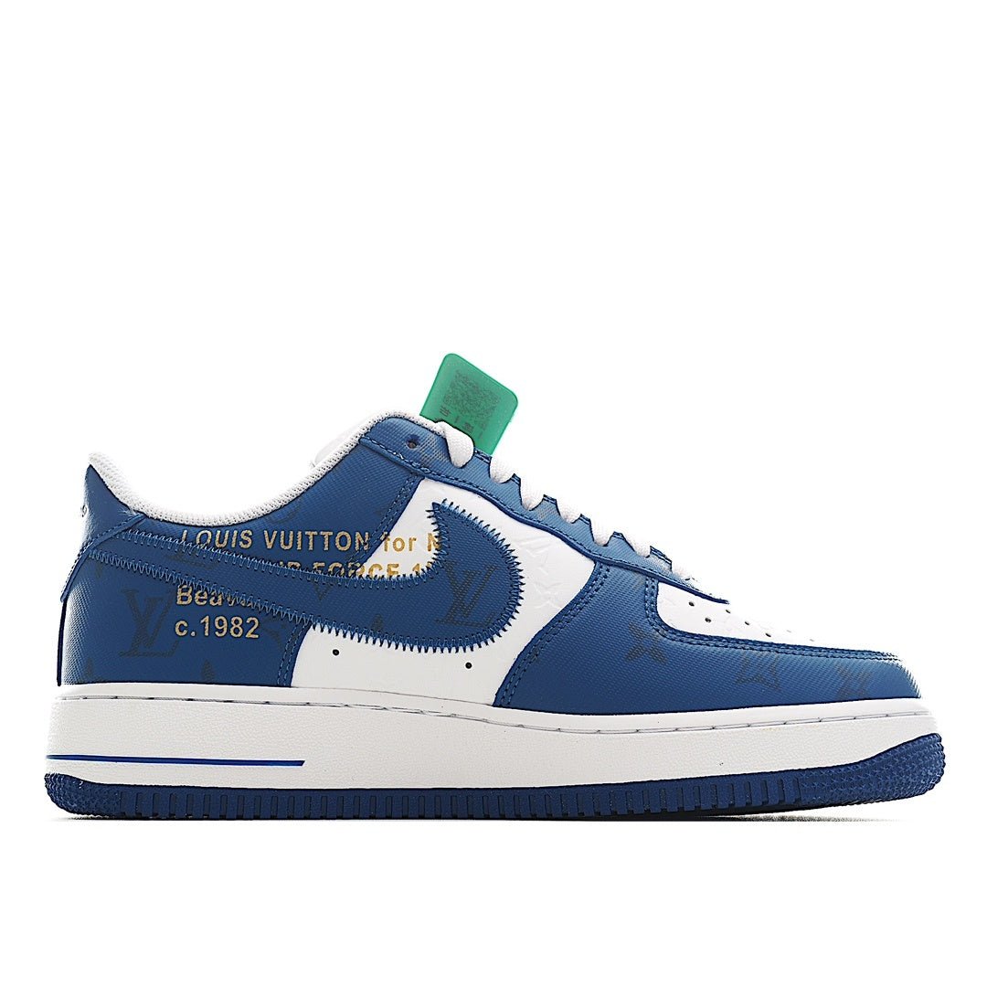 Air Force 1 sneakers in blue and white with green lace tag and swoosh